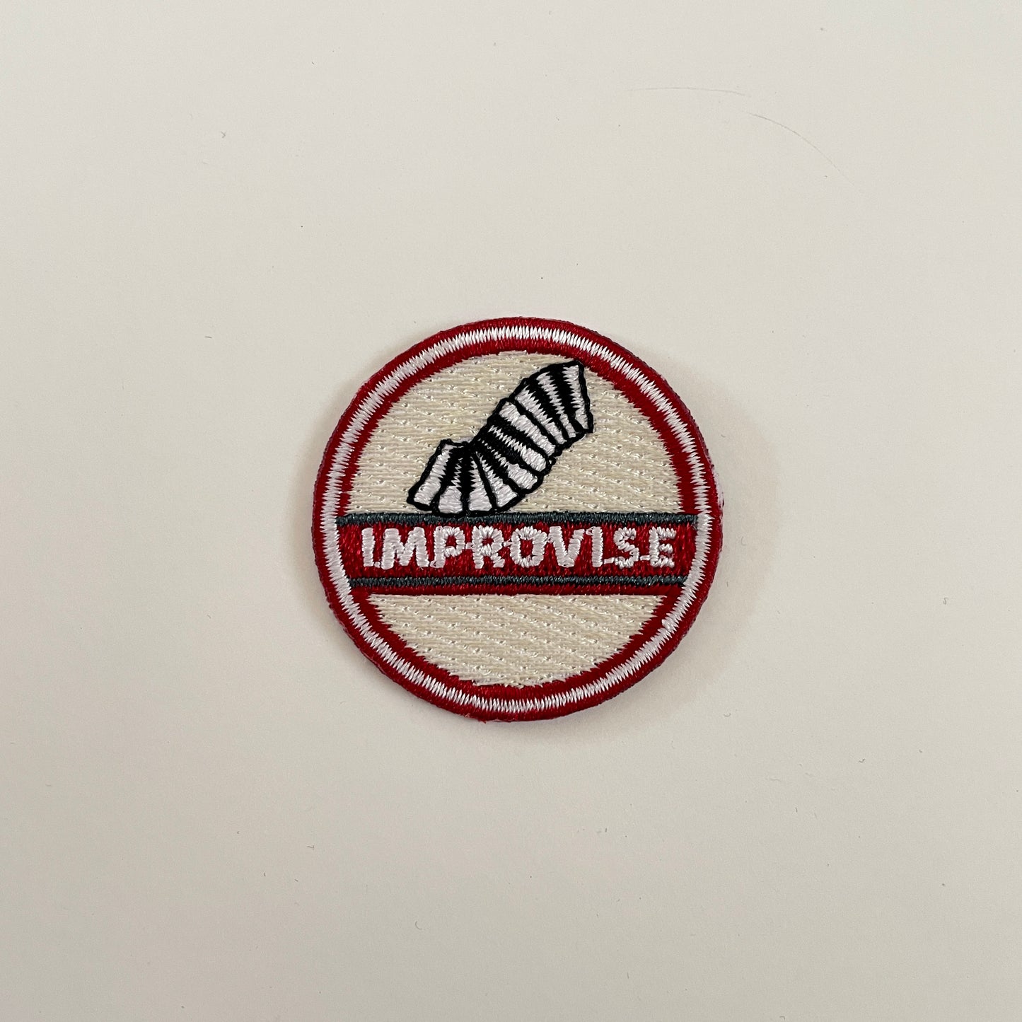 Improvise - Badge
