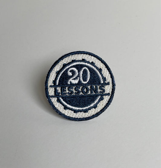 20 Lessons - Badge